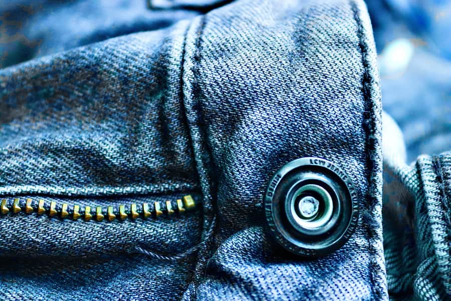 Folded layers of heavy denim and canvas fabric