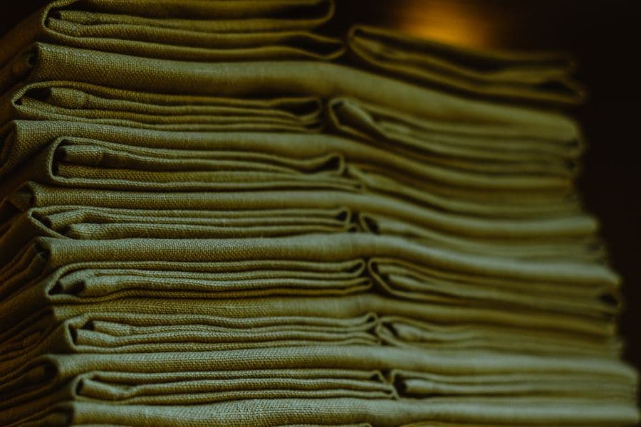 A stack of neatly folded cotton fabric