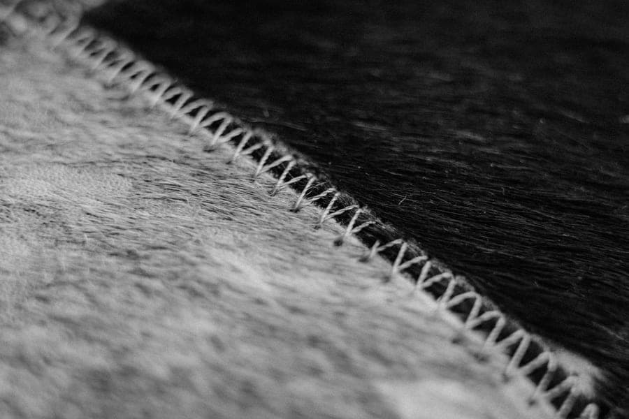 Rows of stitch samples sewn onto a piece of fabric